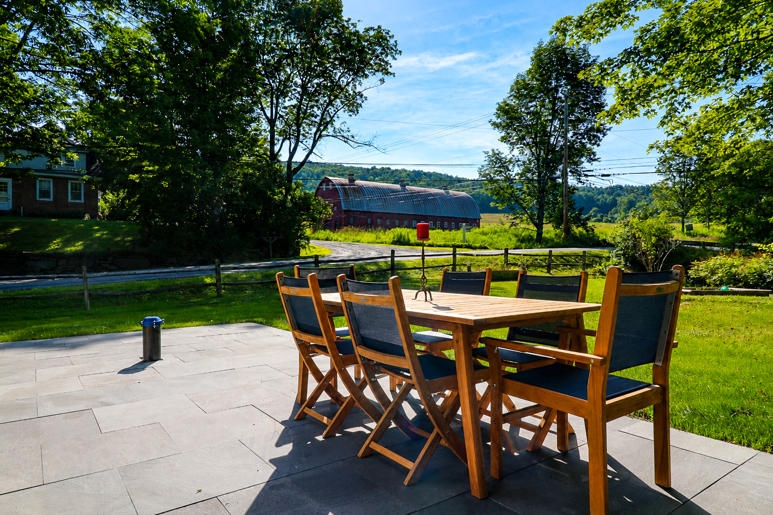 Outdoor dining patio at a welcoming Vermont home